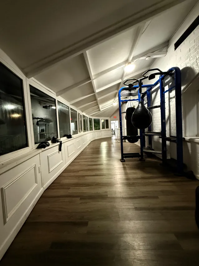 Mirrored wall running the length of the cardio row