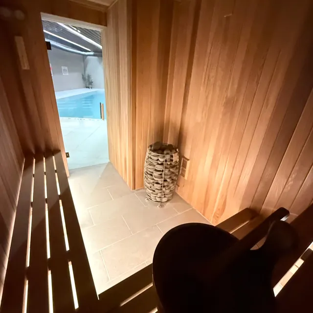 Sauna entrance framed in cedar